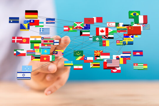 Conceptual image showing a hand connected with multiple country flags symbolizing global connections, unity, and international relations. Repres
