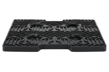 Black rubber anti-vibration pad with a geometric pattern isolated on a transparent background
