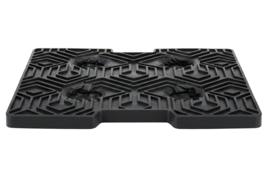 Black rubber anti-vibration pad with a geometric pattern isolated on a transparent background
