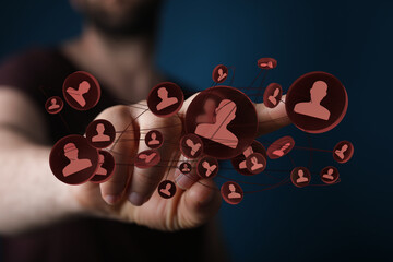 Conceptual representation of social network. Hand touching glowing interfaces connecting people together. Connectivity and global network concep