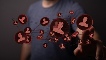 Conceptual illustration of a man touching a digital network with social media user icons, representing digital connection and social media.