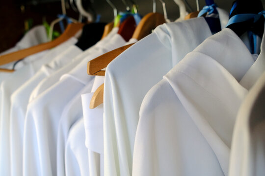 Sacristy in a church. White albs for altar servers Annecy. France.