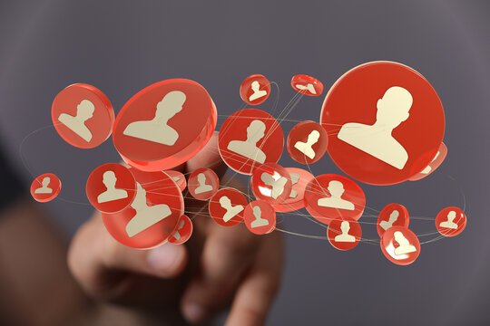 Finger interacting with a network of user icons, representing social media, connections and digital relationships in a technological world.