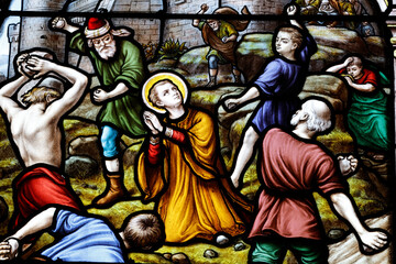 Obraz premium Saint Seine church. Stained glass. Life of Saint-Paul. Stoning of a Christian. Corbigny. France.