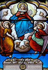 Obraz premium Saint Seine church. Stained glass. The Assumption of Mary into Heaven. Corbigny. France.