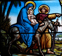 Saint Seine church.  Stained glass. The Flight into Egypt. Holy Family.  Corbigny. France. © Godong Photo