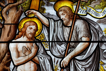 Fototapeta premium Notre-Dame de Beaune basilica. Stained glass. The baptism of Jesus by John the Baptist. Beaune. France.