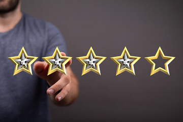 A hand reaching towards gold stars, symbolizing feedback, evaluation, and rating. Perfect for...