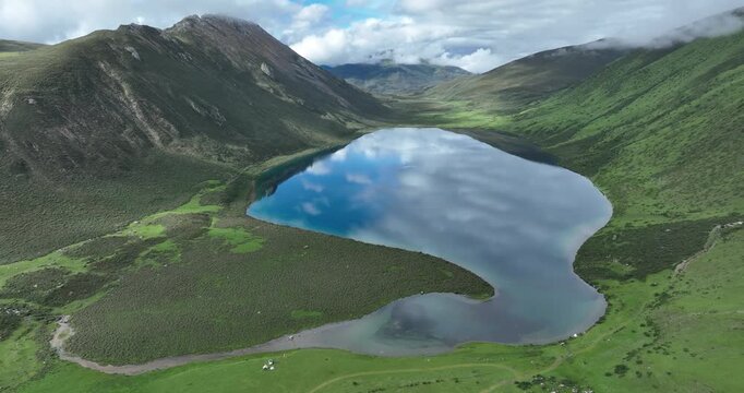 Aerial footage of beautiful foggy dense forest landscape
