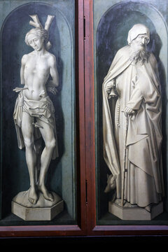 The Hospices de Beaune. Rogier Van Der Weyden (1399-1468) polyptych altarpiece. St Anthony the Great and St Sebastian.   Beaune. France.