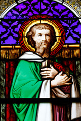 Fototapeta premium Church of Perrecy les Forges. Stained glass. Mark is associated with a lion, symbolizing courage and the voice crying out in the wilderness France.