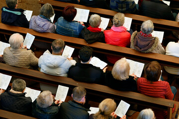 Saint Maurtice church. Holy Thursday. Chrism Mass. Faithful attending mass. Boege. France.