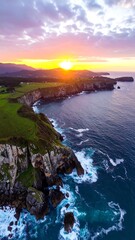 Dramatic sunset over rugged coastline