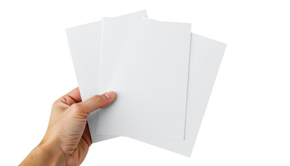 Obraz premium Hand Holding Three Blank Sheets of Paper Minimalist Studio Setting Close-Up Perspective Conceptual Design