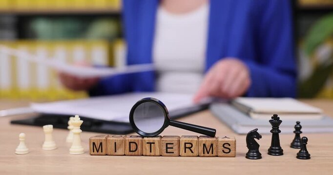 Students prepare for midterms with chess pieces and focused study techniques in a cozy library setting