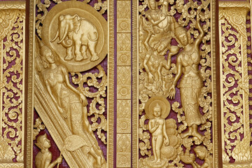 Wat Manorom Buddhist temple. BuddhaÕs Mother Maya dreams about the White Elephant entering her womb. Birth at Lumbini.  Luang Prabang. Laos.