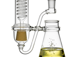 Scientific glass extraction equipment with a coiled condenser on a transparent background