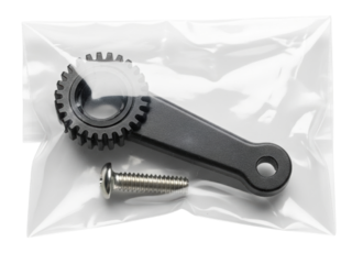 Black plastic gear and a metal screw in a clear plastic bag on a transparent background