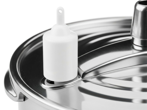 Close-up of a food processor lid with the white food pusher on a transparent background