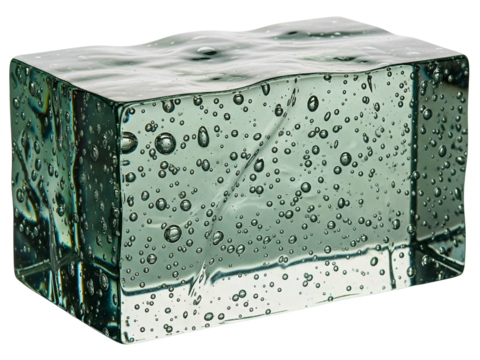 Rectangular green glass brick with many trapped air bubbles on a transparent background