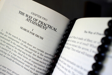 Obraz premium Buddhist liturgical book. The teaching of Buddha. Buddhist prayer beads. Luang Prabang. Laos.