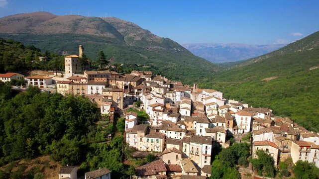 Italy, Abruzzo region tourism . most beautiful medieval villages - Anversa degli Abruzzi in National park surrounded by Apennine mountains. aerial drone 4k hd footage