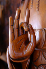 Vinh Nghiem Buddhist Pagoda.  Guan Yin, Guanyin, Quan Am, name for Avalokiteshvara, the bodhisattva of compassion which is usually represented as a female figure.  Mudra.  Ho Chi Minh city. Vietnam.