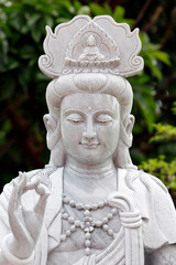 Obraz premium Vinh Trang buddhist Pagoda. Guan Yin, Guanyin, Quan Am, name for Avalokiteshvara, the bodhisattva of compassion which is usually represented as a female figure. My Tho Vietnam.