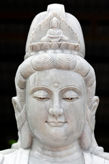 Obraz premium Vinh Trang buddhist Pagoda. Guan Yin, Guanyin, Quan Am, name for Avalokiteshvara, the bodhisattva of compassion which is usually represented as a female figure. My Tho Vietnam.