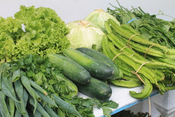 Assorted vegetables on wooden table
