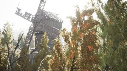 In a picturesque setting, a wooden windmill stands tall amidst colorful trees adorned with autumn foliage. The sunlight filters through, creating a warm and inviting atmosphere.