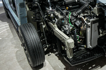 The hybrid car frame construction and engine were showcased at the exhibition.