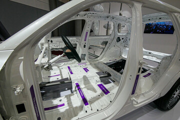 The hybrid car frame construction and engine were showcased at the exhibition.