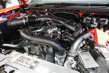 Wiring and layout of car engine. 