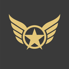 Golden wings emblem with star and ring symbol emblematic design for awards or recognition