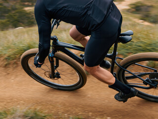 Naklejka premium Mountain bike racer leans into dirt trail with dynamic speed