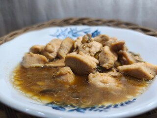 Chicken teriyaki, a delicious, healthy, and fresh dish that is perfect to enjoy as a side dish with warm rice. Food photography concept for product or advertisement and culinary blog post. Close-up.