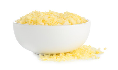 Yellow sea salt in bowl isolated on white