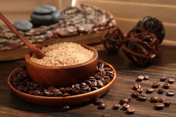 Natural sea salt and coffee beans on wooden table, closeup