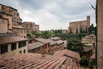 Obraz premium View from the old town Siena to the Basilica of San Domenico, also known as Basilica Cateriniana, Siena, Tuscany, Italy