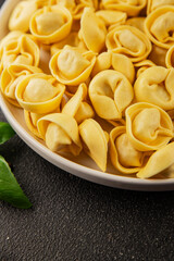 Ravioli raw filled homemade pasta filled raviolis tasty snack fresh delicious gourmet food background on the table rustic top view copy space vegetarian food