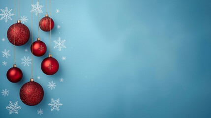 Christmas background with red baubles and snowflakes on blue backdrop, festive holiday decoration concept