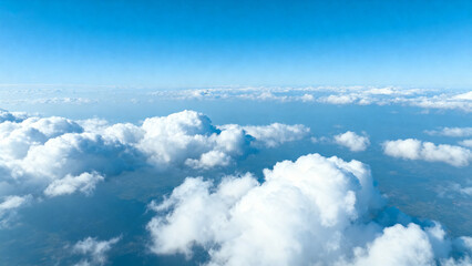 Clouds from above against blue sky