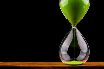 Hourglass for timing work and life. Concept of time and quality time management. High quality...
