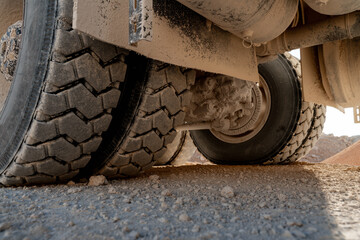 Heavy machinery moving rocks at mining site