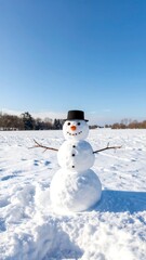 Fototapeta premium A snowman stands in a field of snow under a clear blue sky. He has a black top hat, an orange carrot nose, and two coal button eyes. Simple, cheerful snowman on a winter day