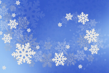 Christmas blue background of white snowflakes flying in the air. Holiday card for New Year and Christmas with space for greetings, labels and your design.