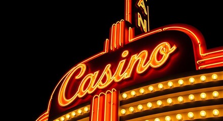 Bright neon casino sign glowing at night with a dark sky background