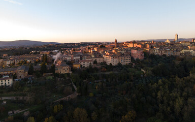 Obraz premium Sienna, Italy during a warm sunset