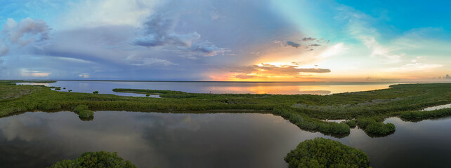 Beautiful sunset over Mangrove ecosystem in Quintana Roo © Omar